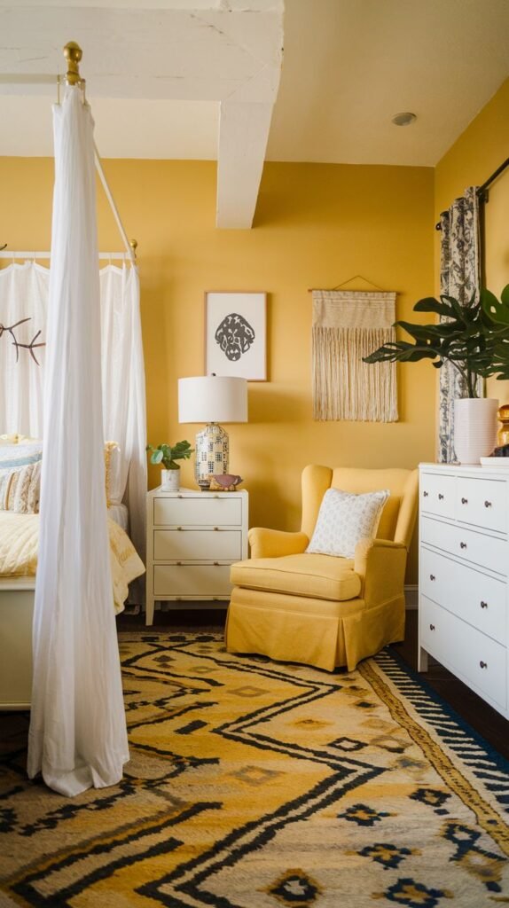A cozy yellow bedroom with a bed, a yellow armchair, a chest of drawers, and patterned rug.